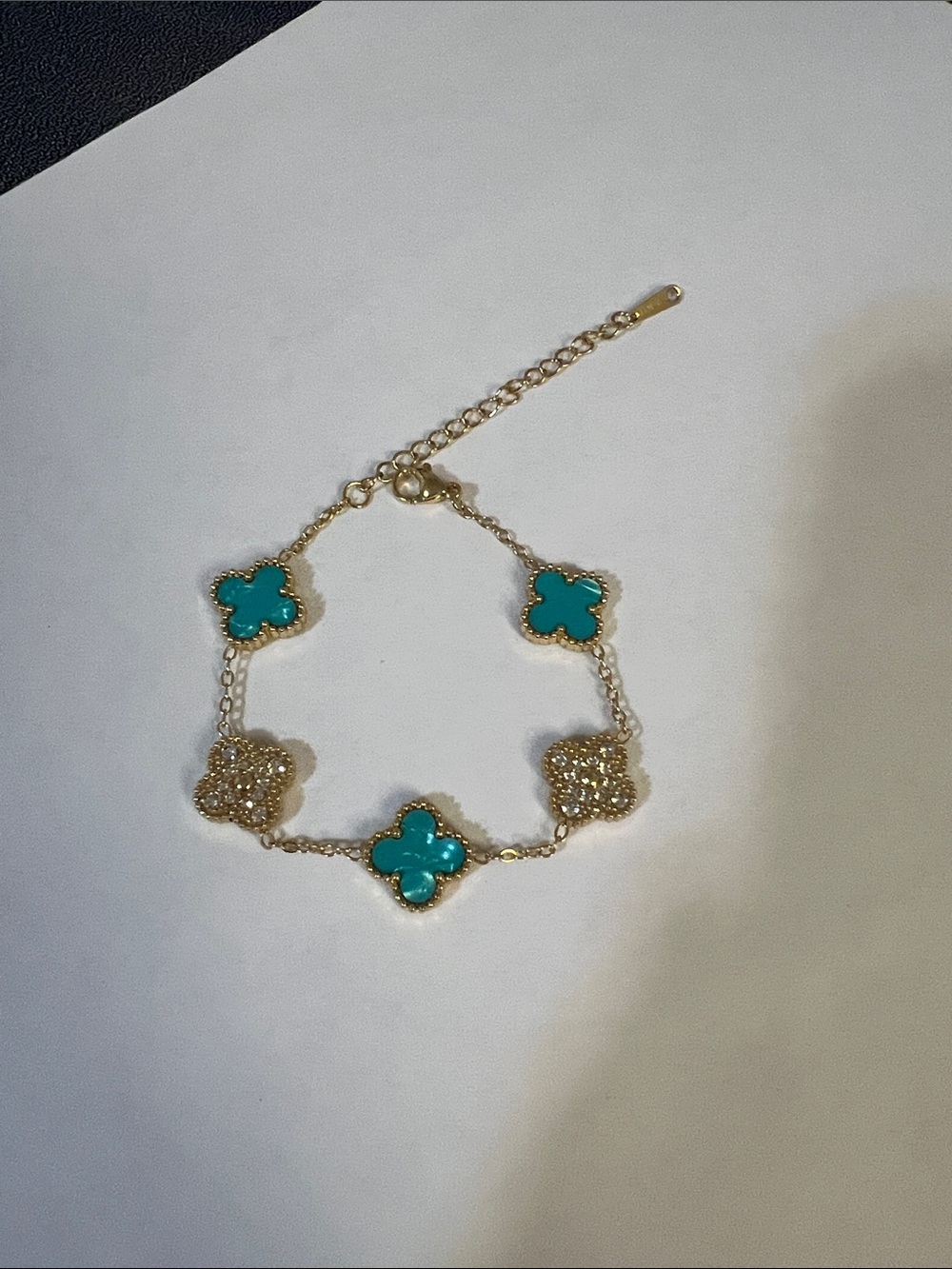 Gold Bracelet with Teal Clover Accents